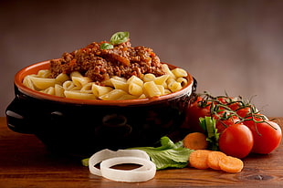 straight-cut macaroni with tomatoes and beef toppings